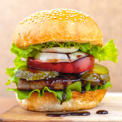 Burger on a wooden board