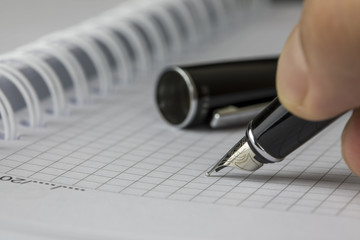 Hand Holding , Writing Pen , Paper and Form
