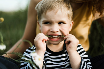 portrait of a young boy outdoors