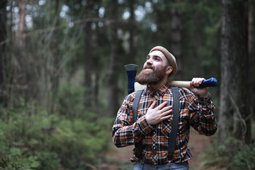 A bearded lumberjack with a large ax 