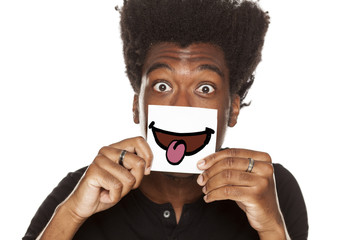 Happy young african man with smile, drawn on sheet of paper on white background