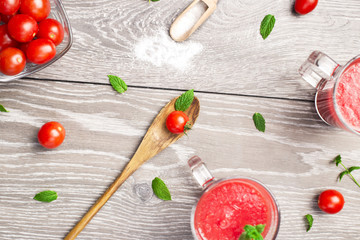 Top view of beverages from tomato juice in glass mugs