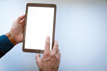 Human Hand Holding Digital Tablet