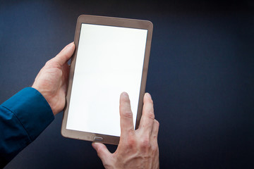 Human Hand Holding Digital Tablet