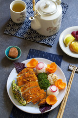 Japanese style  lunch with onigiri rice balls and crispy chicken