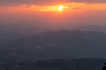 Fototapeta premium Dramatic sunset over the hills