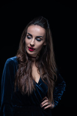 Naklejka premium vampire woman with red lips isolated on black