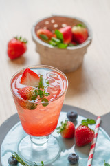 Strawberry juice mixed with soda