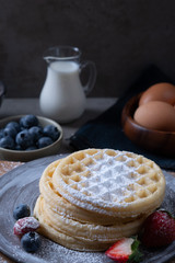 Pancakes with berries and sugar
