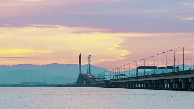 The Penang bridge against the background of spectacular dawn. 4k time-lapse
