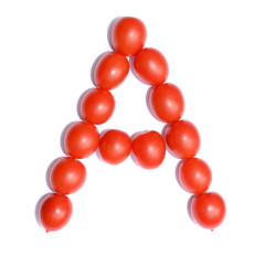 The letter A is made of tomato. Symbol of the English alphabet of tomato on a white background.