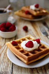Belgian waffles with raspberry for breakfast