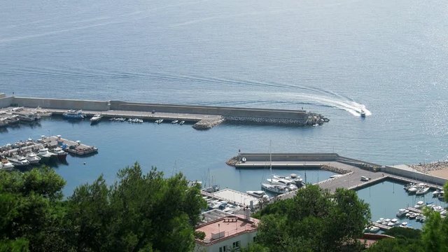 Yacht club, marina with large number of boats, yachts, sailboat and pleasure boats. Boat tour, short sea trip. Mediterranean sea. 
