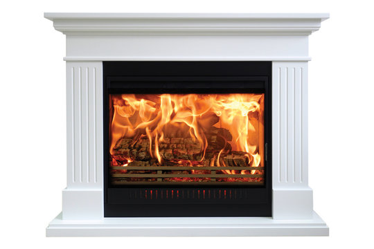 Burning classic fireplace of white marble. Isolated on white