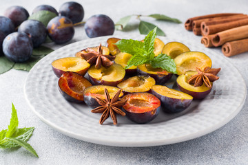 Fresh berries plums in the context of cooking on the plate