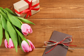 tulips and gifts on the table