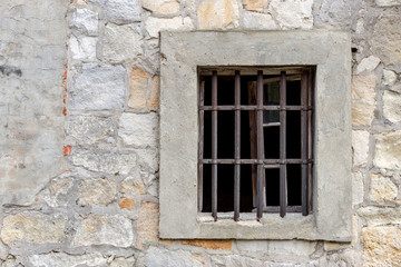 Fototapeta na wymiar Old window in historic building