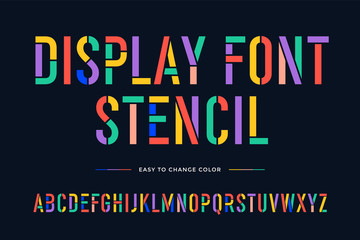 Stencil font. Colorful condensed alphabet and font. Condensed bold uppercase stencil letters. Type, typography letter latin font. Hand-drawn modern narrow font for headline, text. Vector Illustration
