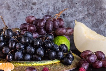 Raw Organic Fruit Platter with Berries Melons and Grapes