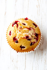 Home made muffin with red currant. Close-up. Flat lay