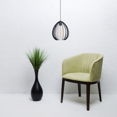 Composition of furniture and lamp on a light background