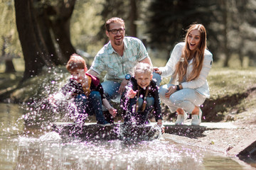 happy family having fun on the lake.