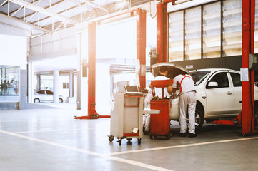 car repair station with soft-focus and over light in the background