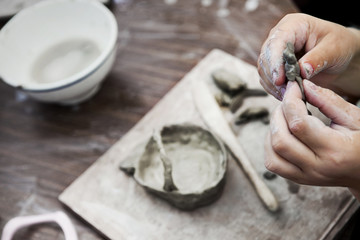 Making small pottery in a school workshop