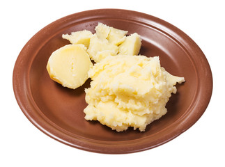 boiled and mashed potatoes on plate isolated