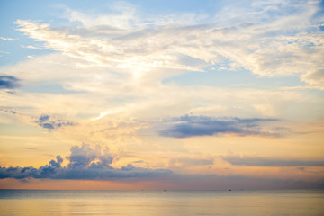 Sunrise in sea the morning  amidst the clouds and the sky is beautiful quiet atmosphere feeling lonely