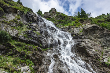 Fototapeta na wymiar Romania Karpaty waterfall on the Transfogaraska route