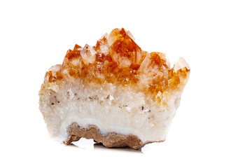 Macro mineral stone Citrine in rock in crystals on a white background