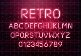 Light neon font letter set. Bar sign vector type. Glowing casino and cinema red text alphabet on brick wall background. Retro background.