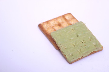 cracker with matcha jam toping