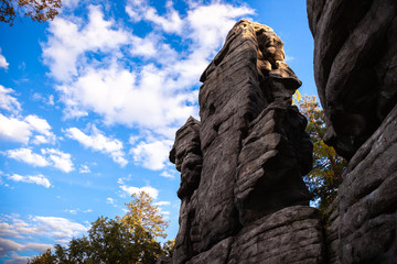 rocks against the blue sky and forest