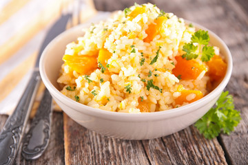 pumpkin risotto on wood background