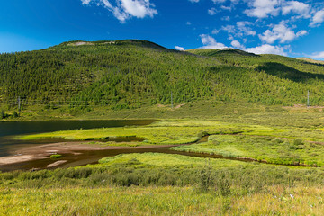 Fototapeta na wymiar The valley of Lake Cheybekkol, against the backdrop of the mountains, Altai Republic, Russia