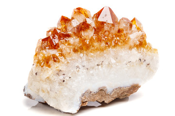 Macro mineral stone Citrine in rock in crystals on a white background