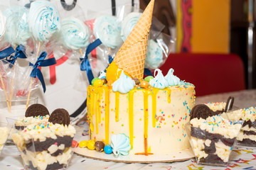 Birthday cake and sweets for holiday table