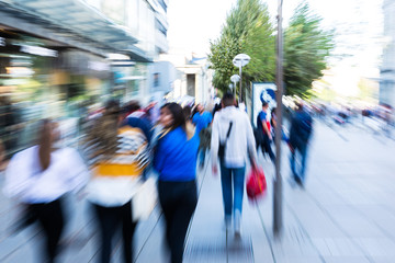 creative zoom picture of shopping people in the city