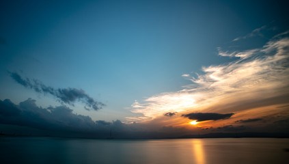 Summer sunset with small waves on the Atlantic coast