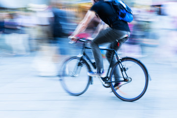 bicycle rider in the city in motion blur