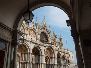 Fototapeta na wymiar August 2018: Photo from iconic Saint Mark square in famous Venice, Italy. View of Basilica di San Marco