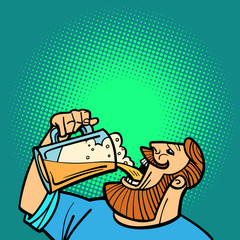 Bearded man drinking a mug of beer