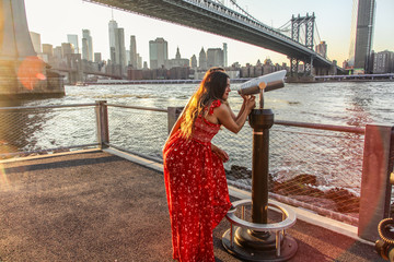 Women in NYC on River Overlooking NYC