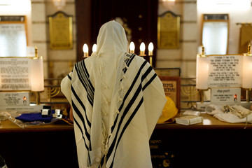 Orthodox ultra Orthodox Jew from a tallit in the synagogue Yom Kippur, Sukkot - obrazy, fototapety, plakaty