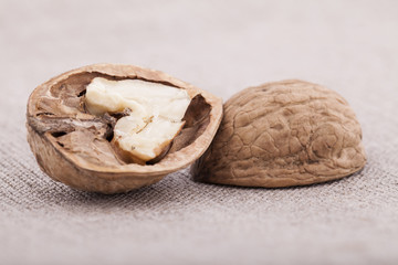 Walnuts on textile background close up group