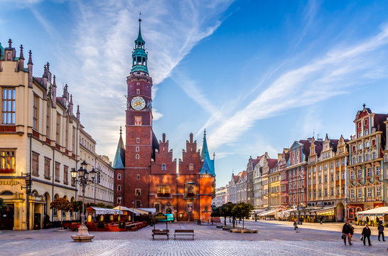 Market Square with Town Hall in Wroclaw, Poland early in the morning. Colorful cities concept.