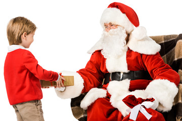 santa presenting christmas gift to kid isolated on white