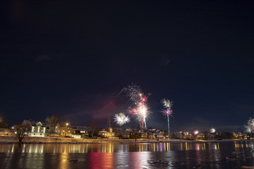 Celebration of New Year's Eve with fireworks in Bronnoysund Northern Norway